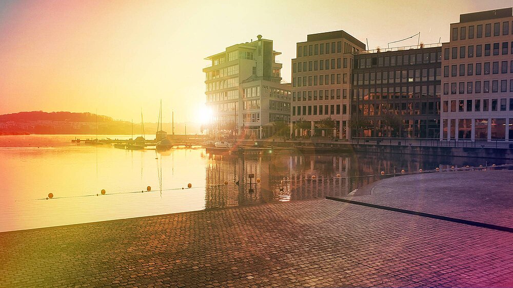 Standort der WECOTEC GmbH am Phoenixsee in Dortmund bei Sonnenaufgang